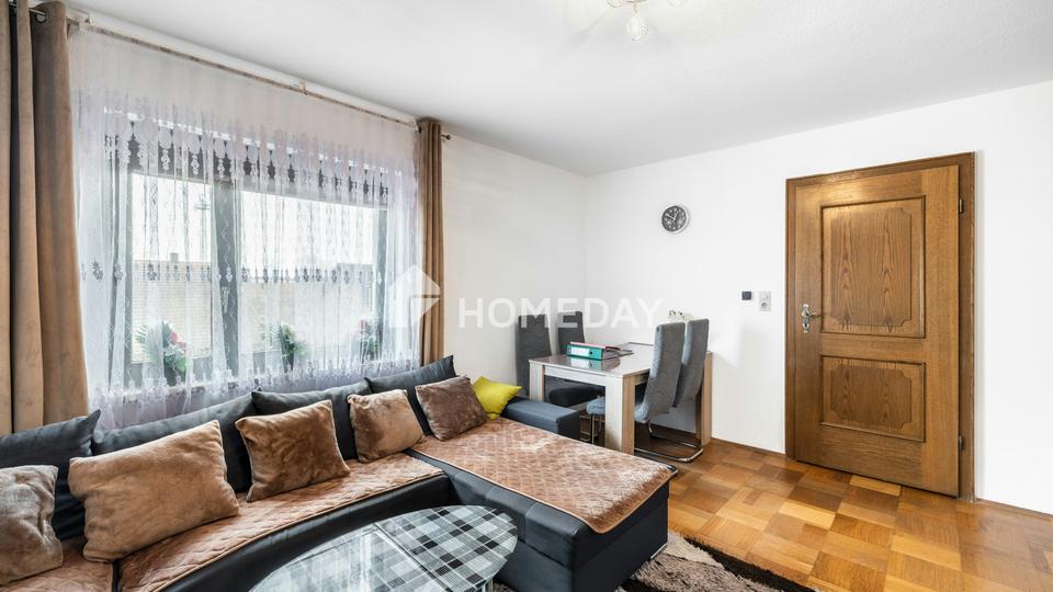 Großzügig & vielseitig: Zweifamilienhaus mit Garten, 2 Garagen und Balkonen in Krondorf – Bild 12