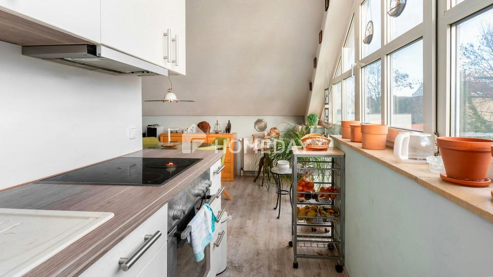 Familienfreundliche Maisonette-Wohnung mit Garten und Stellplatz in zentraler Lage – Bild 4