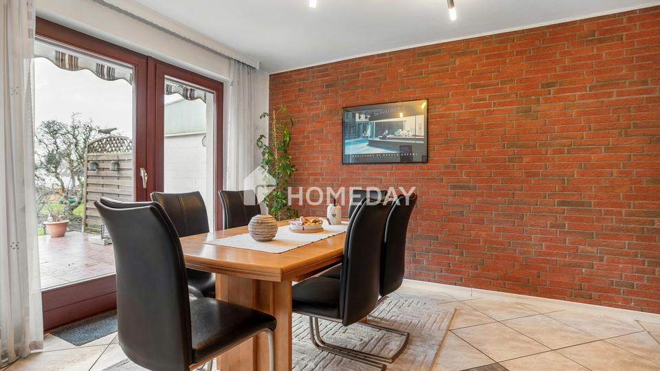 Architektonisches Split-Level-Reihenhaus mit 156 m² Wohnfläche, Fußbodenheizung & Westgarten – Bild 2