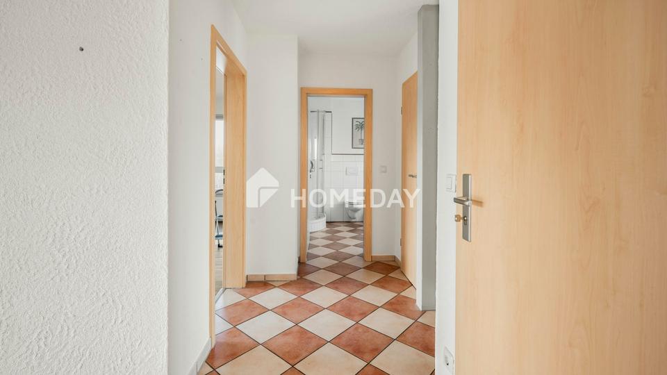 Lichtdurchflutete 3-Zimmer-Dachgeschosswohnung mit Dachterrasse und Blick in grüne Weite – Bild 9