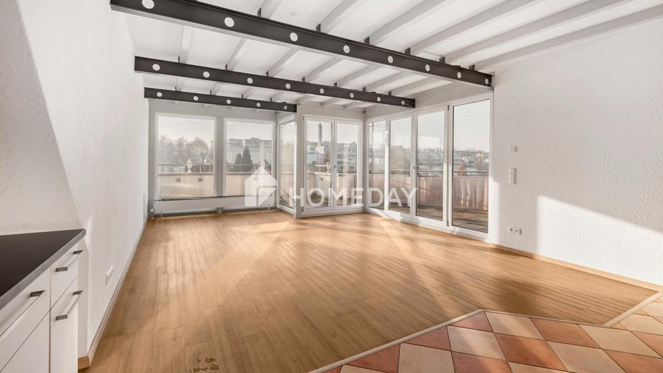 Lichtdurchflutete 3-Zimmer-Dachgeschosswohnung mit Dachterrasse und Blick in grüne Weite – Bild 2