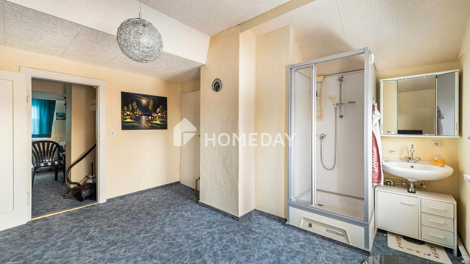 Stilvolles Zweifamilienhaus mit Vollkeller, Gartenidylle und vielseitigen Nutzungsmöglichkeiten – Bild 30