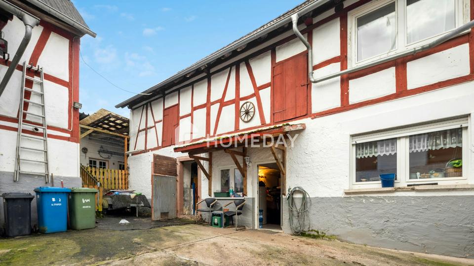 Einfamilienhaus mit Scheune und Nebengebäuden in ruhiger Lage – Bild 4