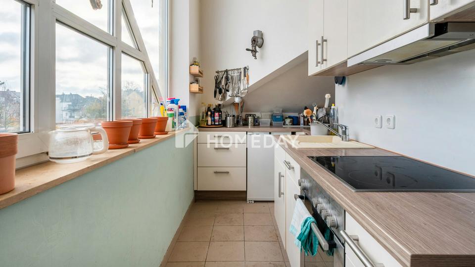 Familienfreundliche Maisonette-Wohnung mit Garten und Stellplatz in zentraler Lage – Bild 3