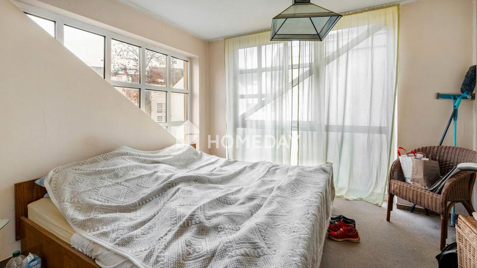 Familienfreundliche Maisonette-Wohnung mit Garten und Stellplatz in zentraler Lage – Bild 5