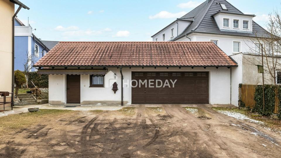 Großzügig & vielseitig: Zweifamilienhaus mit Garten, 2 Garagen und Balkonen in Krondorf – Bild 2