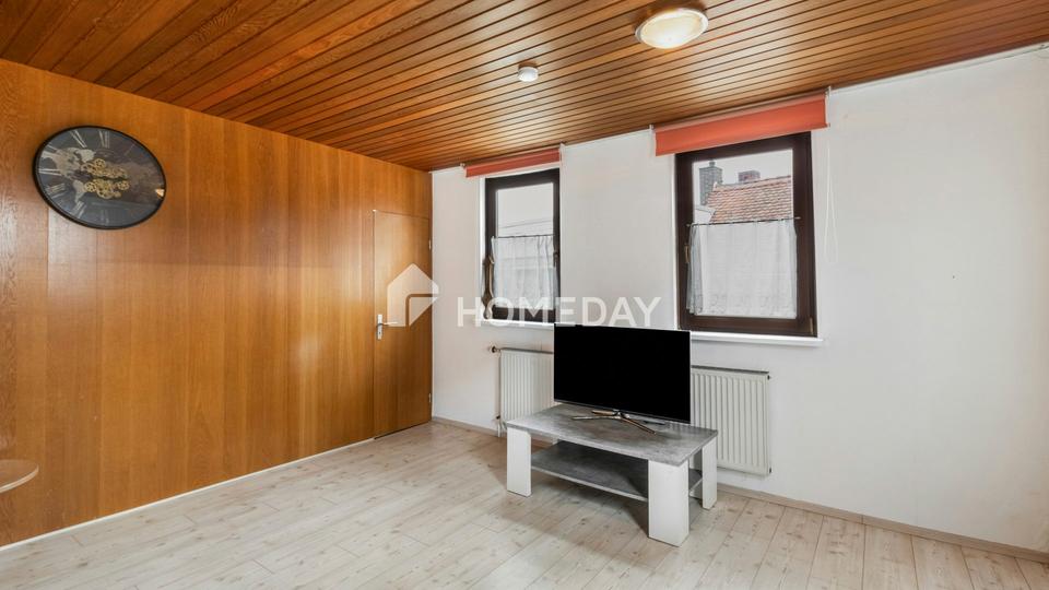 Gepflegtes Mehrfamilienhaus mit vier Wohnungen, Restaurant, Terrasse und Hof in Sulzbach am Main – Bild 7