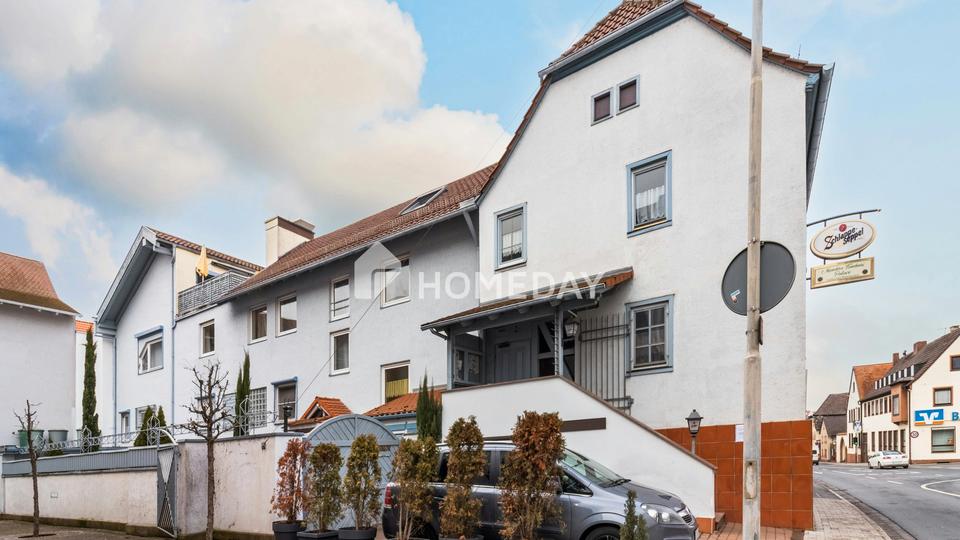 Gepflegtes Mehrfamilienhaus mit vier Wohnungen, Restaurant, Terrasse und Hof in Sulzbach am Main