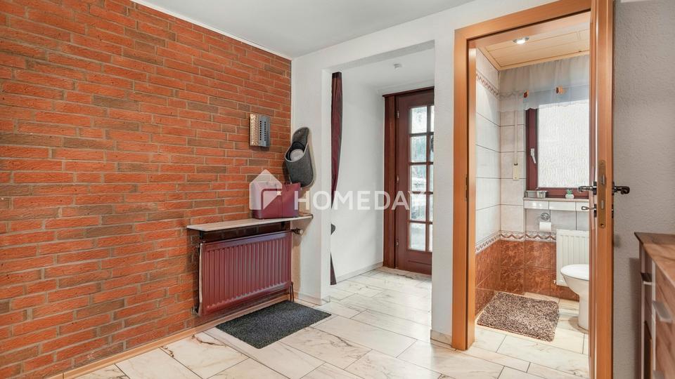 Architektonisches Split-Level-Reihenhaus mit 156 m² Wohnfläche, Fußbodenheizung & Westgarten – Bild 9