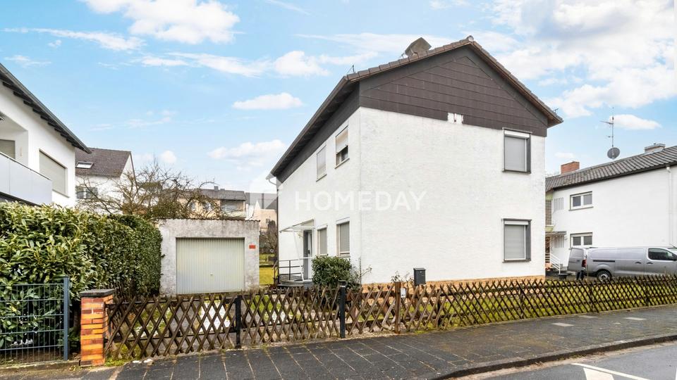 Familienhaus mit Gartenidylle, Terrasse und Balkon in beliebter Wohnlage